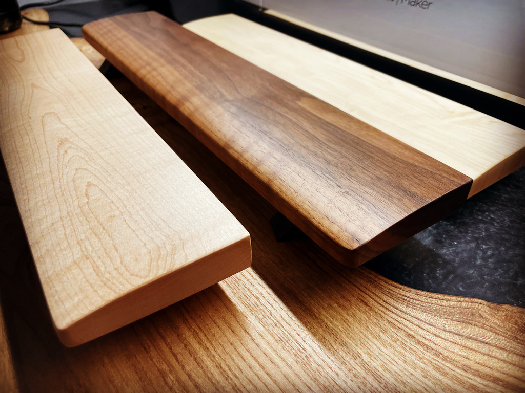 Handmade wooden wrist rest on display