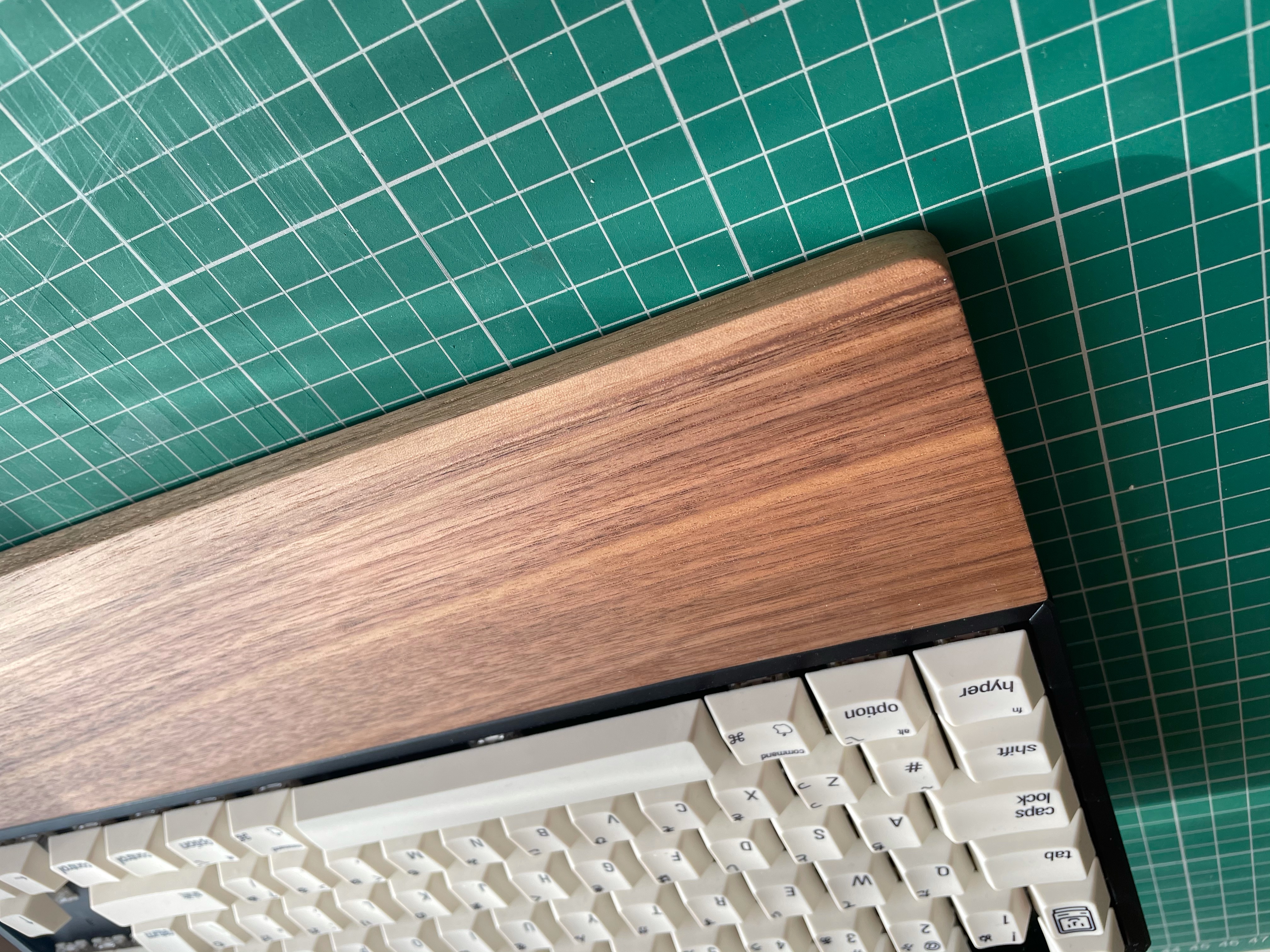 Handmade wooden wrist rest with natural timber grain